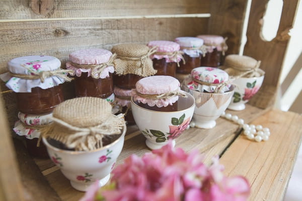 Jars of jam in teacups