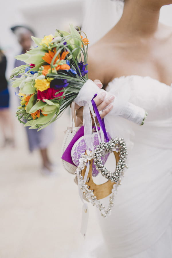 Bride holding colourful bouquet