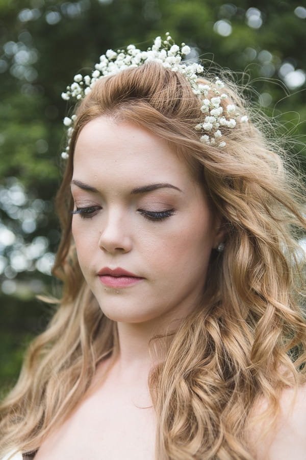Cascading waves bridal hairstyle with hair accessory