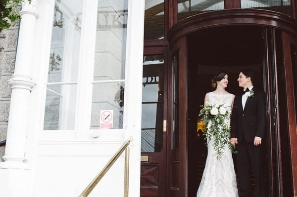 Bride and groom leaving Duke of Cornwall Hotel