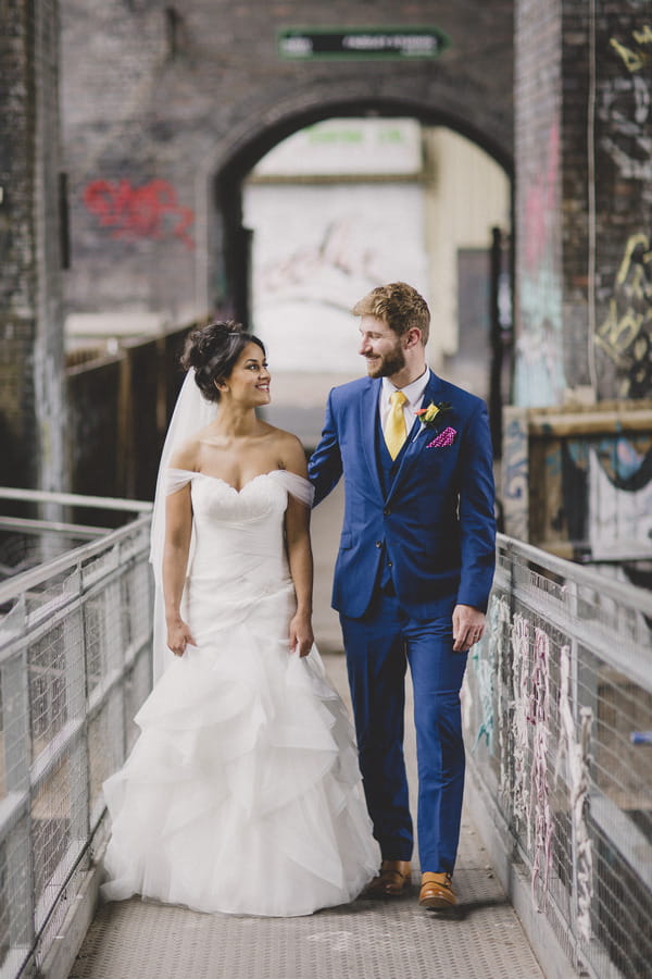 Bride and groom on walkway