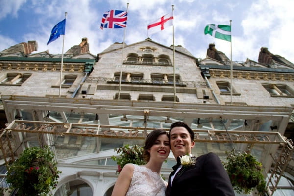 Bride and groom outside Duke of Cornwall Hotel