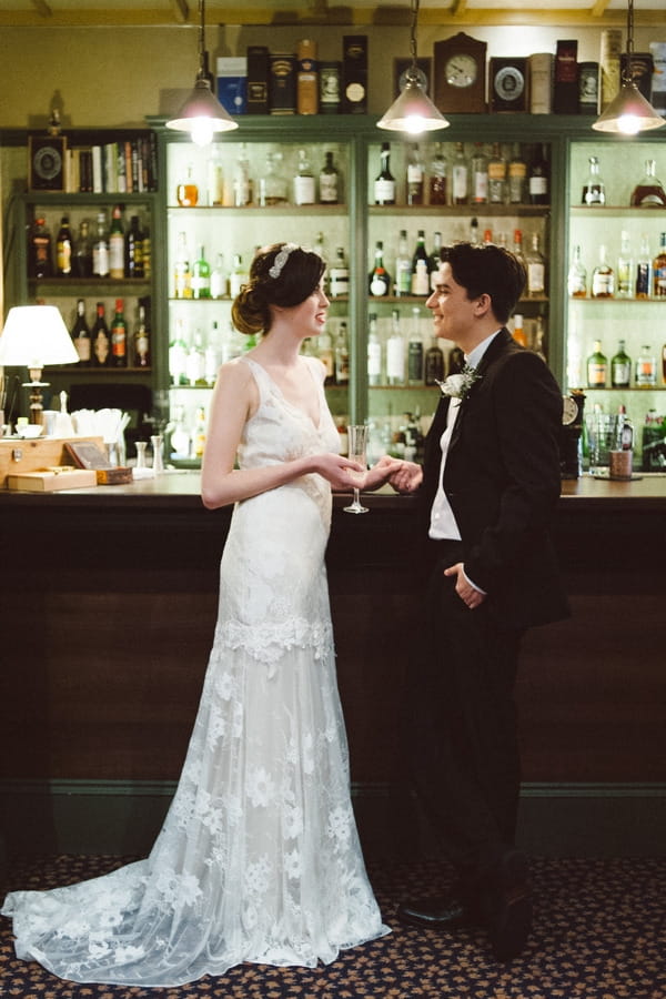 Retro bride and groom at bar