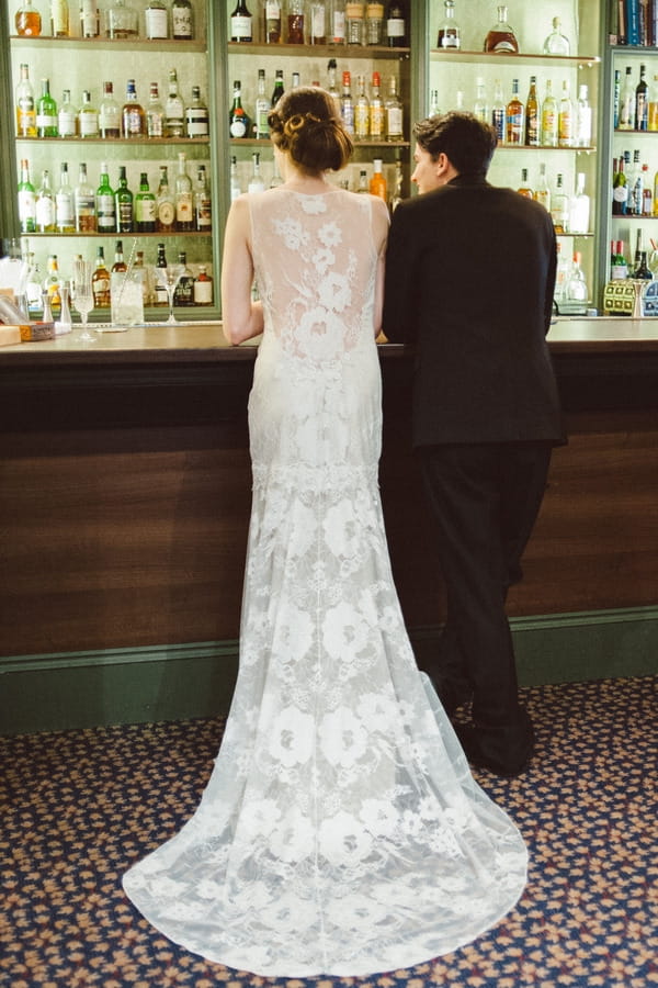 Back of brides long lace wedding dress