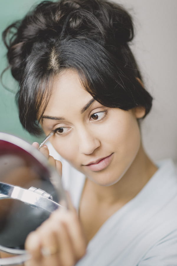 Bride doing make-up