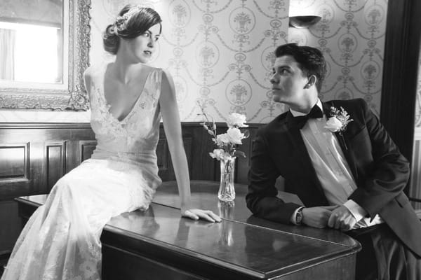 Retro bride and groom on piano