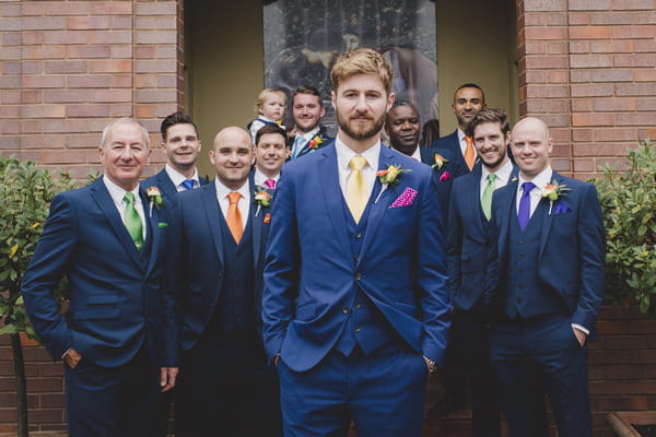 Groom and groomsmen in blue suits