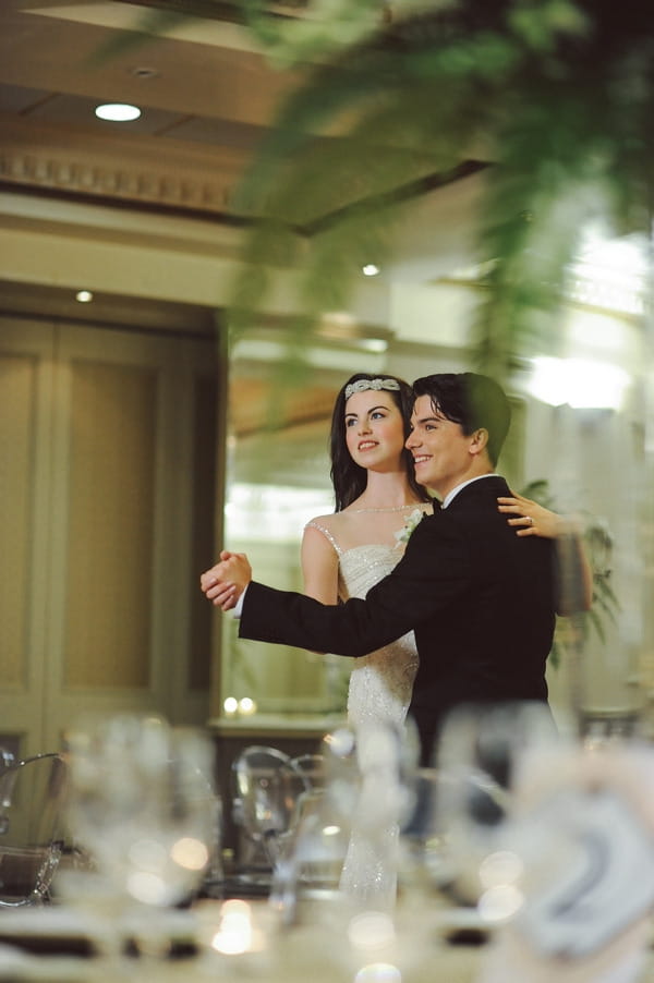 Retro bride and groom dancing in ballroom at Duke of Cornwall Hotel