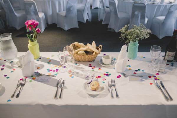 Wedding table with colourful confetti