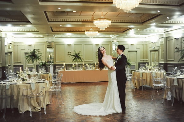 Retro bride and groom dancing in ballroom at Duke of Cornwall Hotel