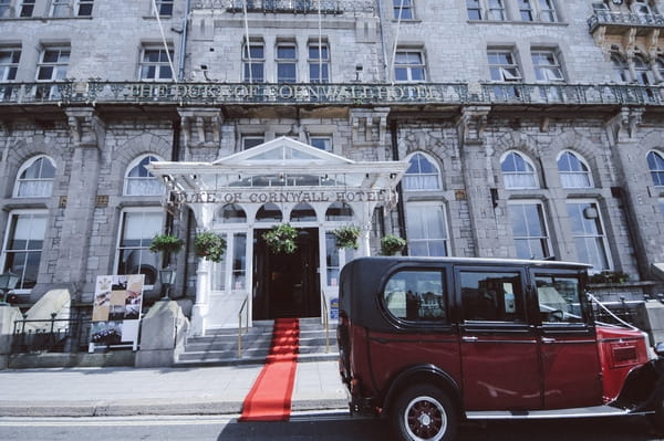 Vintage taxi outside Duke of Cornwall Hotel