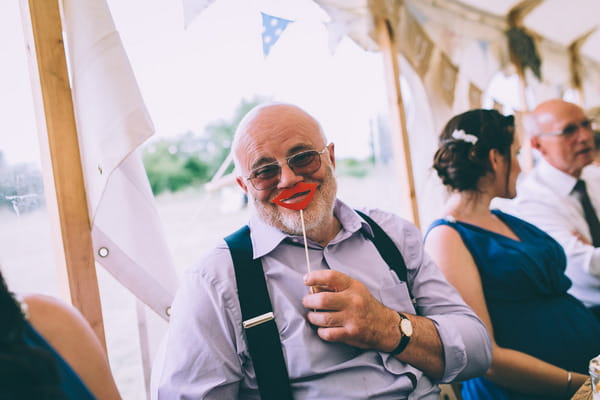 Wedding guest with prop lips