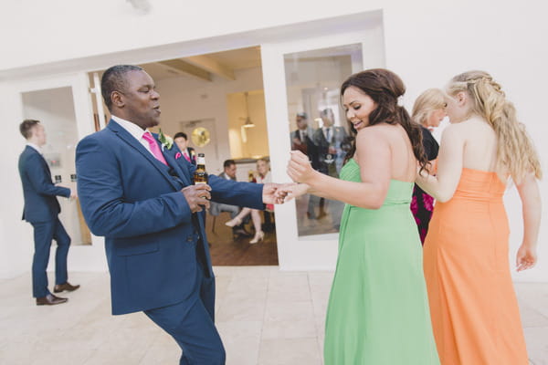 Wedding guests dancing