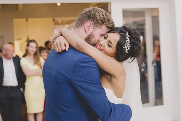 Bride and hug on dance floor