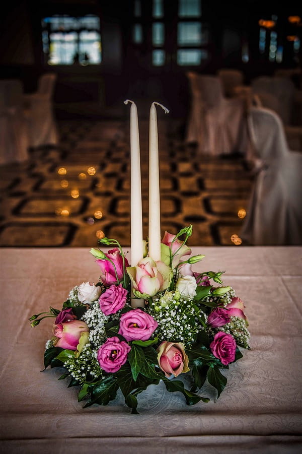 Tall candle wedding table centrepiece