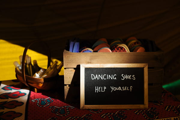 Box of dancing shoes at wedding