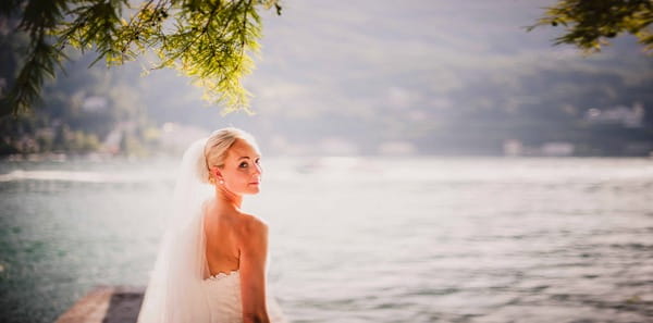 Bride standing by Lake Maggiore, Italy