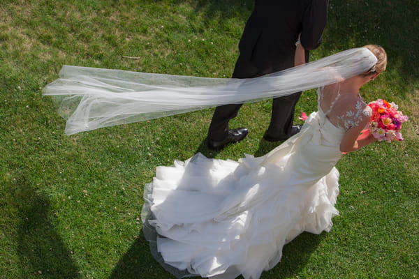 Bride's veil blowing in wind