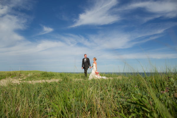 Bride and groom walking on Nantucket Island