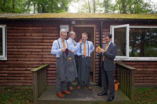 Groomsmen with orange ties