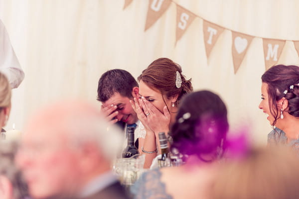 Bride and groom embarrassed by speech