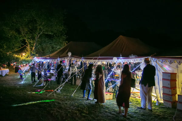 Festival wedding in marquee at night