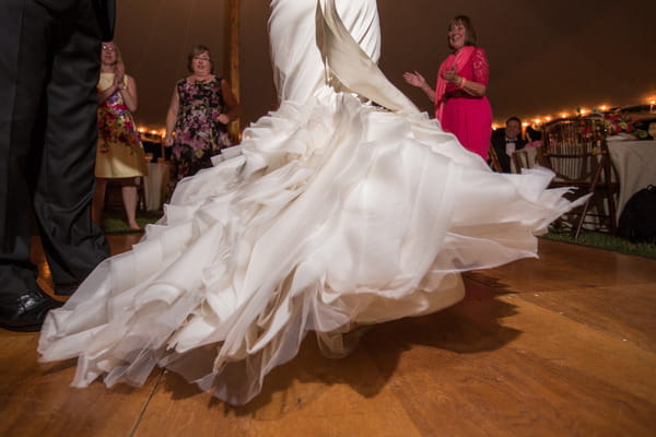 Bride's dress twirling on dance floor