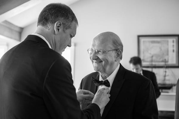 Groom and father before wedding