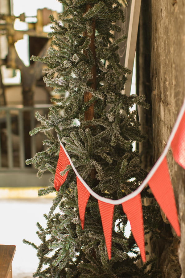 Red bunting and Christmas tree