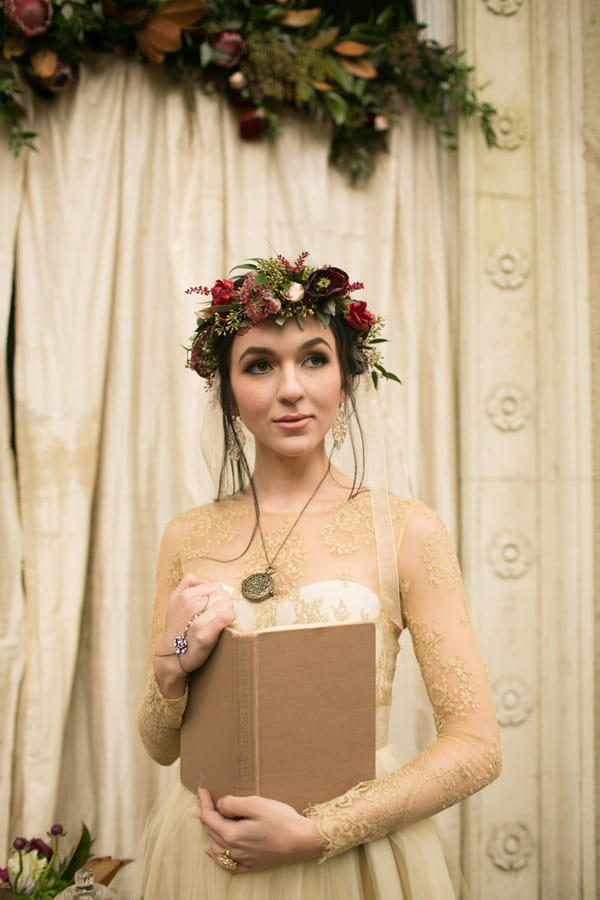 Bride with flower crown holding book