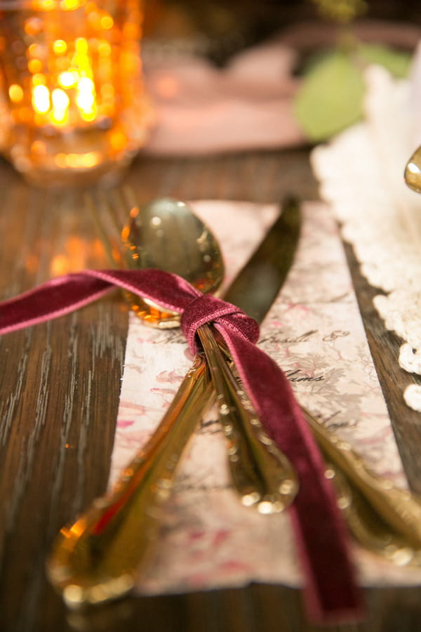 Cutlery tied with marsala coloured ribbon