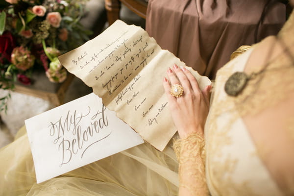 Bride opening Beethoven inspired love letter