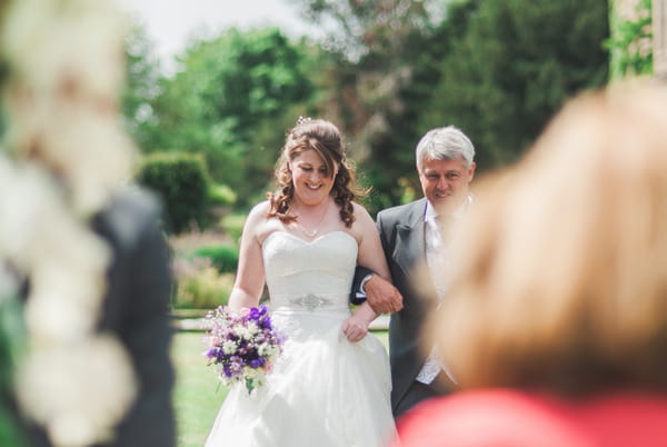 Father walking bride down aisle at Narborough Hall Gardens