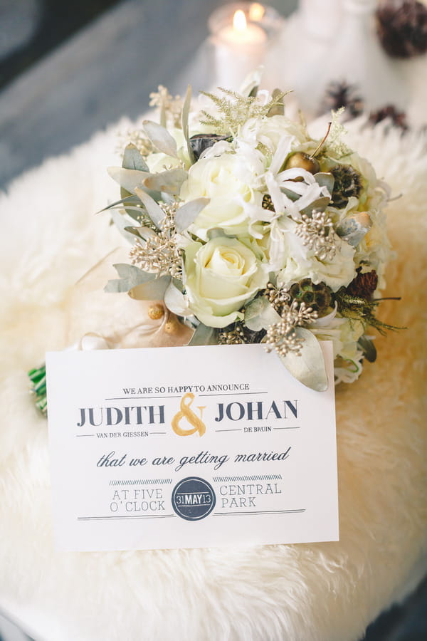 Wedding invitation and winter bouquet