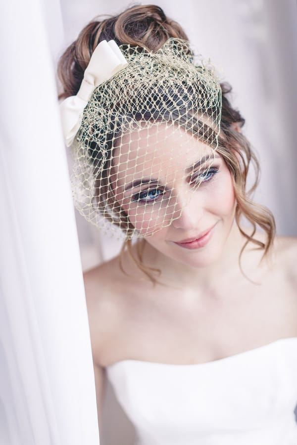 Bride with birdcage veil