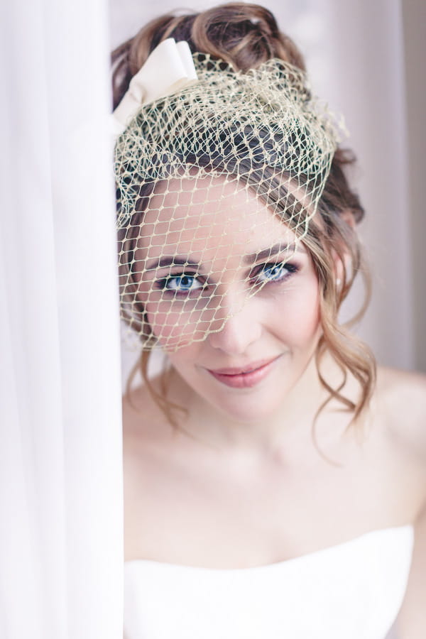 Bride with birdcage veil
