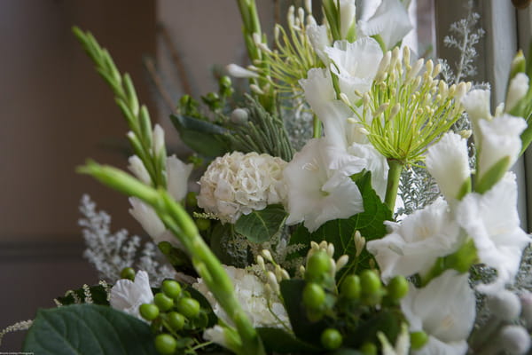 White and green wedding flower arrangement