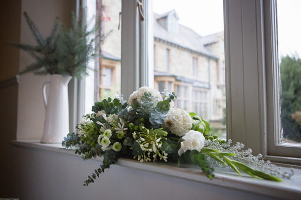 Elegant wedding flower arrangement in white and green