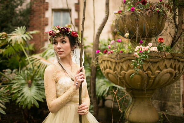 Bride standing in garden