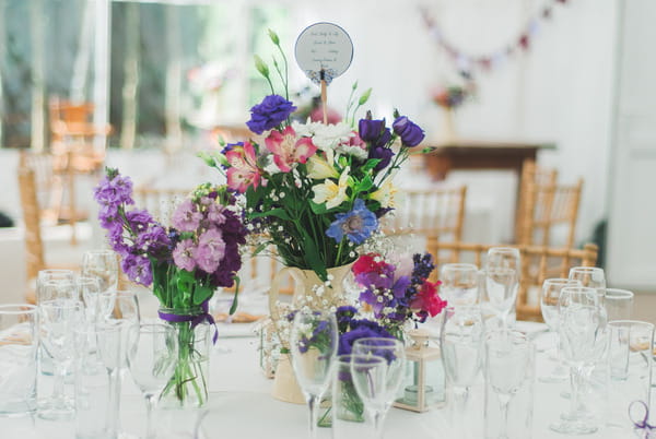 Purple wedding table flowers