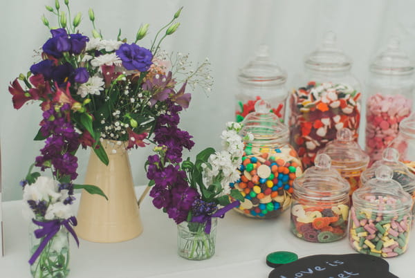 Purple flowers and jars of sweets