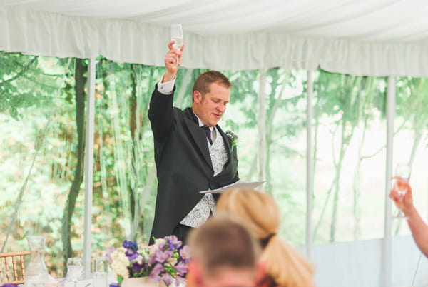 Best man raising toast