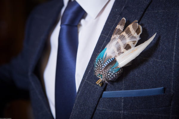 Groom's feather buttonhole