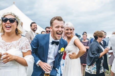 Groom laughing at wedding - Picture by Sarah Janes Photography