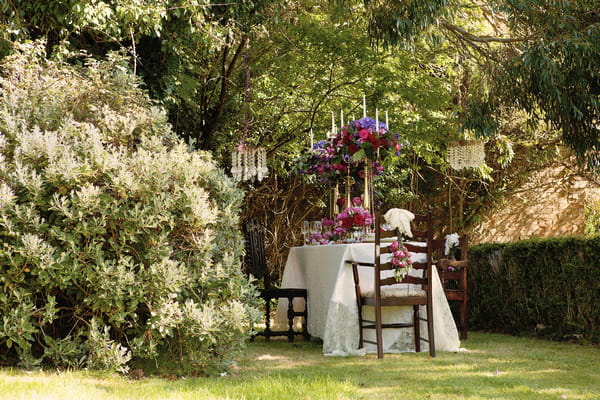 Styled wedding table in garden of Tros Yr Afon