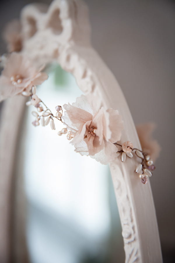 Flower bridal accessory over mirror