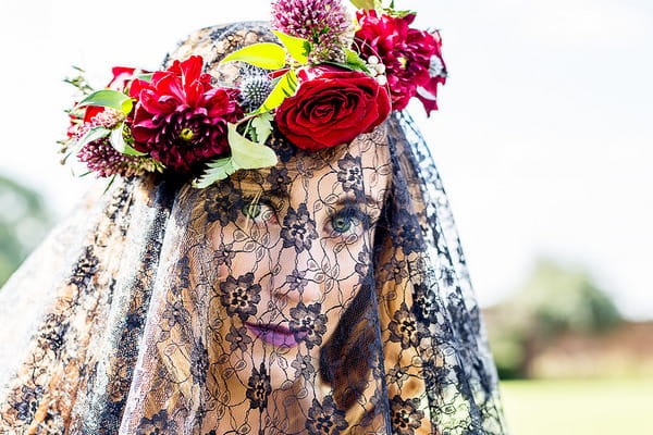 Bride with black lace veil and flower crown