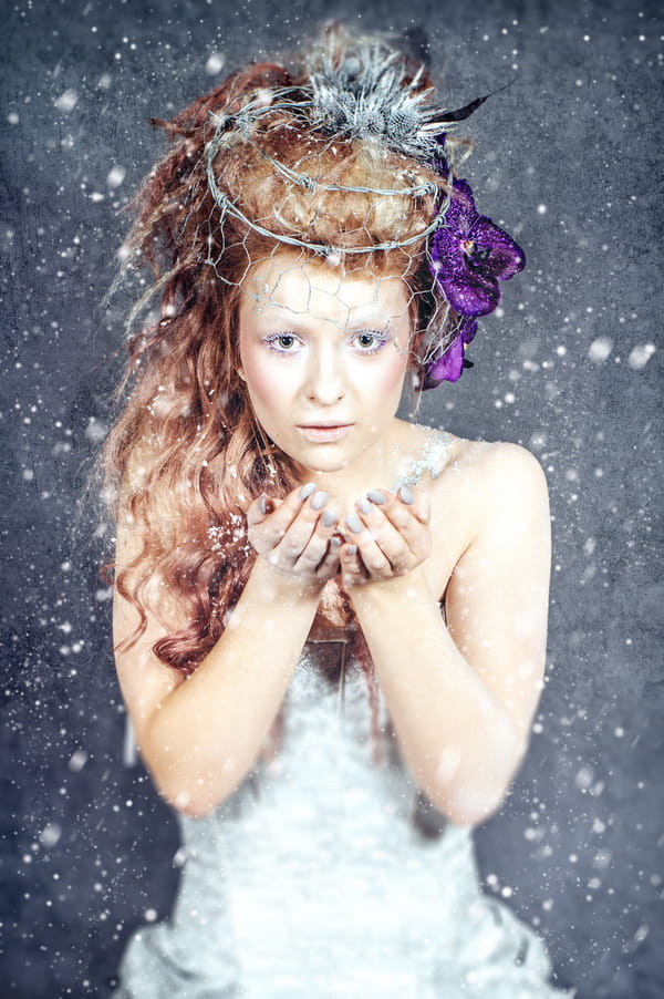 Winter styled bride with chicken mesh and barbed wire veil