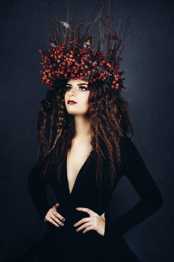 Bride in black dress with winter berry crown