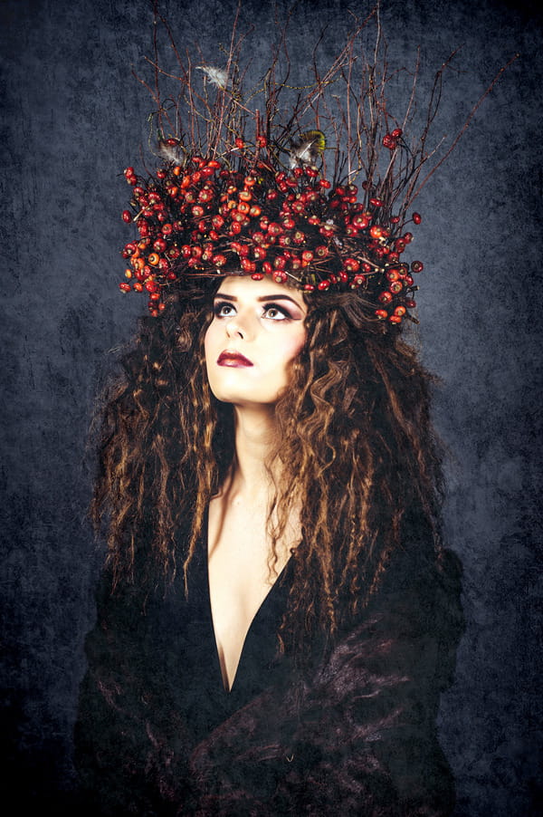 Alternative bride in black dress and winter berry crown